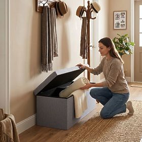 Kárpitozott puff 111x38 cm tárolóhellyel világosszürke ModernHome, MODERNHOME
